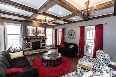 Light filled Living Room with custom electric fire