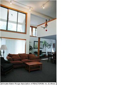 Living room with 17' ceilings