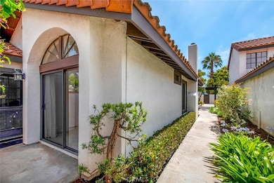As you enter through the gated entry there is a separate entrance to both the Master bedroom and second bedroom.  Interior courtyard is nicely landscaped and in great condition!