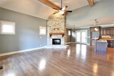 Great Room With Custom Stone Gas Fireplace
