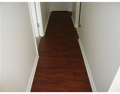 Exterior Front. New floor in hall which opens to m