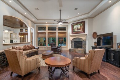 Family room is open to the kitchen with views of t