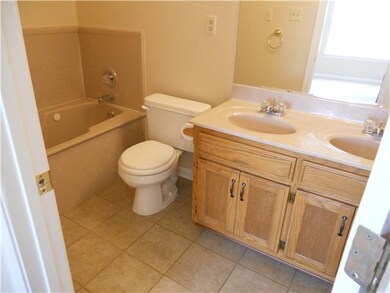 New tile, double sinks, separate shower (to the right not in picture)