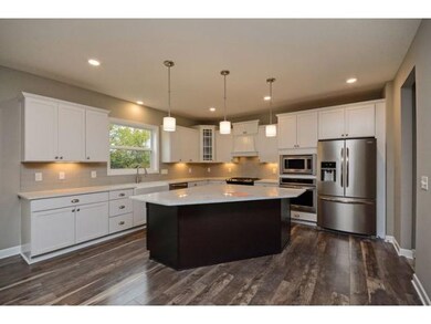 Sleek and Modern Kitchen with Cloud White Quartz, 