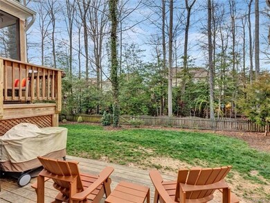 Fenced backyard with natural area behind - nice an