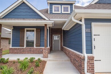 Entrance to property with a garage