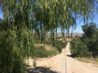 view from driveway down to Grand Ave.
