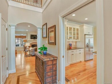Two Story Entrance Foyer with Beautiful Hardwood F