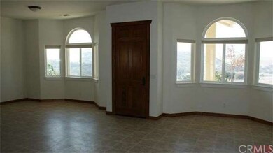 great room with living and dining areas