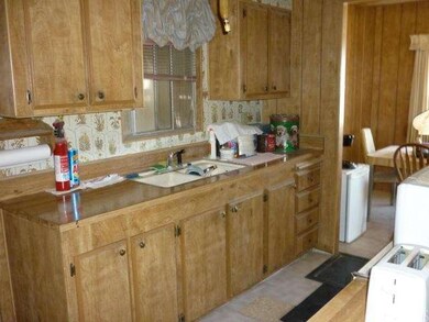 KITCHEN W/VINYL FLOORING