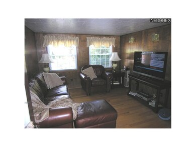Cozy Family Room with newer big windows to the bac