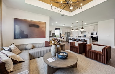 Sunlit gathering room designed for relaxation and entertainment *Model representation
