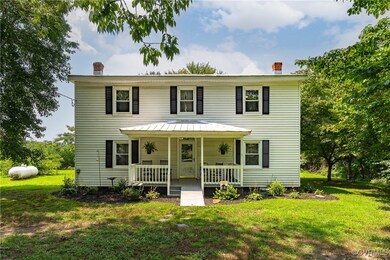 View of front of property with a porch and a front