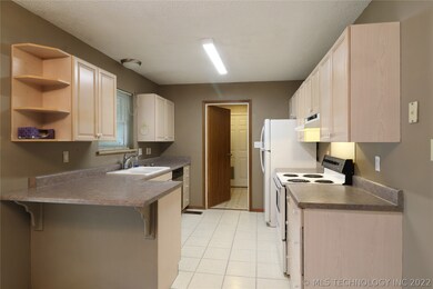 Kitchen from Casual Dining area