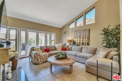 Living room with vaulted ceilings