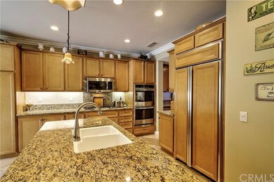 Kitchen with built-in refrigerator and brand new s