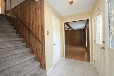 Upstairs features four spacious bedrooms, includin