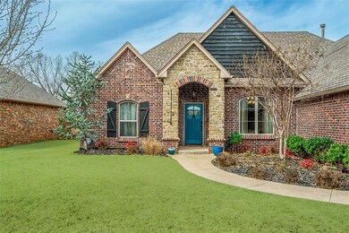 View of front of house featuring a shingled roof, 