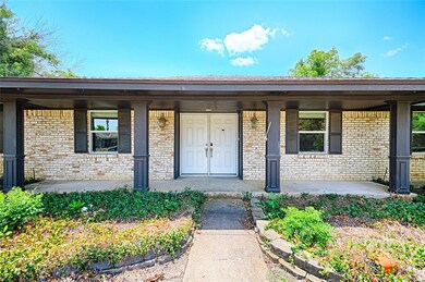 Single story home featuring a porch