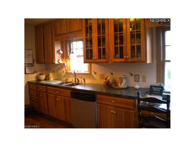 Newer Kitchen with Parkay Pecan Flooring.