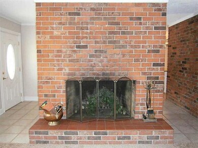 Den/Family/Great Room. All brick fireplace makes f