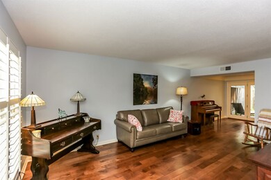 Spacious, warm and inviting great room opens to th