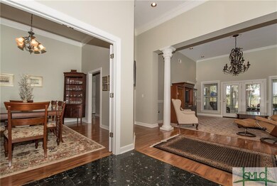 Formal dining, formal living room plus hall to all