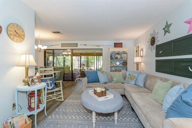 From the foyer, look through the living room to th