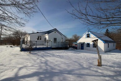 This home boasts a large front yard