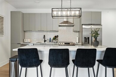 Kitchen featuring appliances with stainless steel