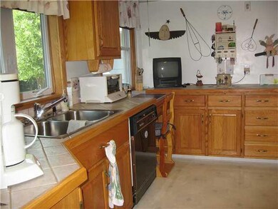 Kitchen. Two sinks and handy kitchen office space,