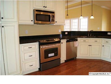 Alternate view of kitchen.