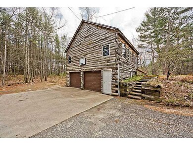 Other. 2 car garage with workshop above.