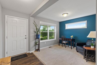 Currently shown as an office, it  could be a formal dining room or play area.