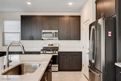 Kitchen featuring appliances with stainless steel