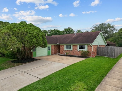 Charming single-story brick home on a spacious cor