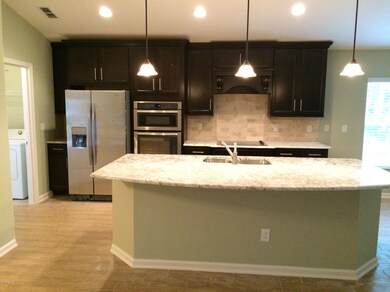 kitchen with porcelain tile in main area