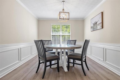 Dining area featuring light hardwood / wood-style 