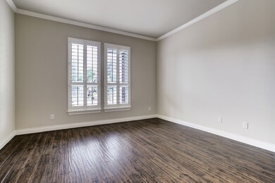 This large secondary bedroom is located on the first floor and has its own private bathroom.