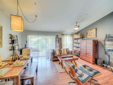 Living room with 3 door slider.