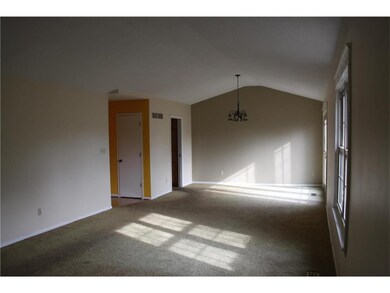 Large, sundrenched living room looking onto the fo