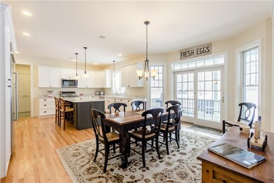Kitchen/dining area of great room with sliding gla