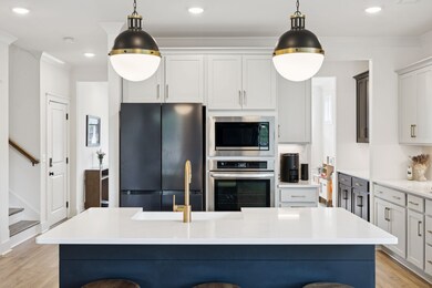 This stunning kitchen is the heart of the home, featuring a bright and airy open concept layout perfect for entertaining. 3534 Madrid Way Murfreesboro, TN 37129