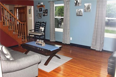 Spacious living room with gorgeous hard wood floor