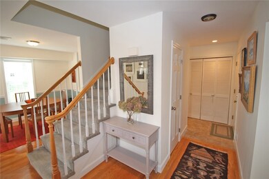 Front Entry. Half Bath on left in hallway. Laundry
