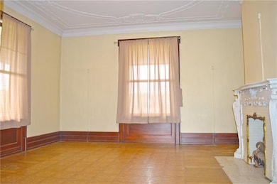 Lady's Lounge with Dignified Fireplace and Ornate 