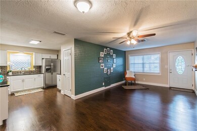 Living area, kitchen and dinette