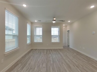 Unfurnished room featuring recessed lighting, vis