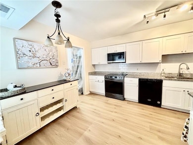 Big kitchen remodeled (2024) to include granite countertops and stainless-steel appliances (2024),