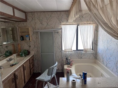 Bathroom with natural light and a bath
